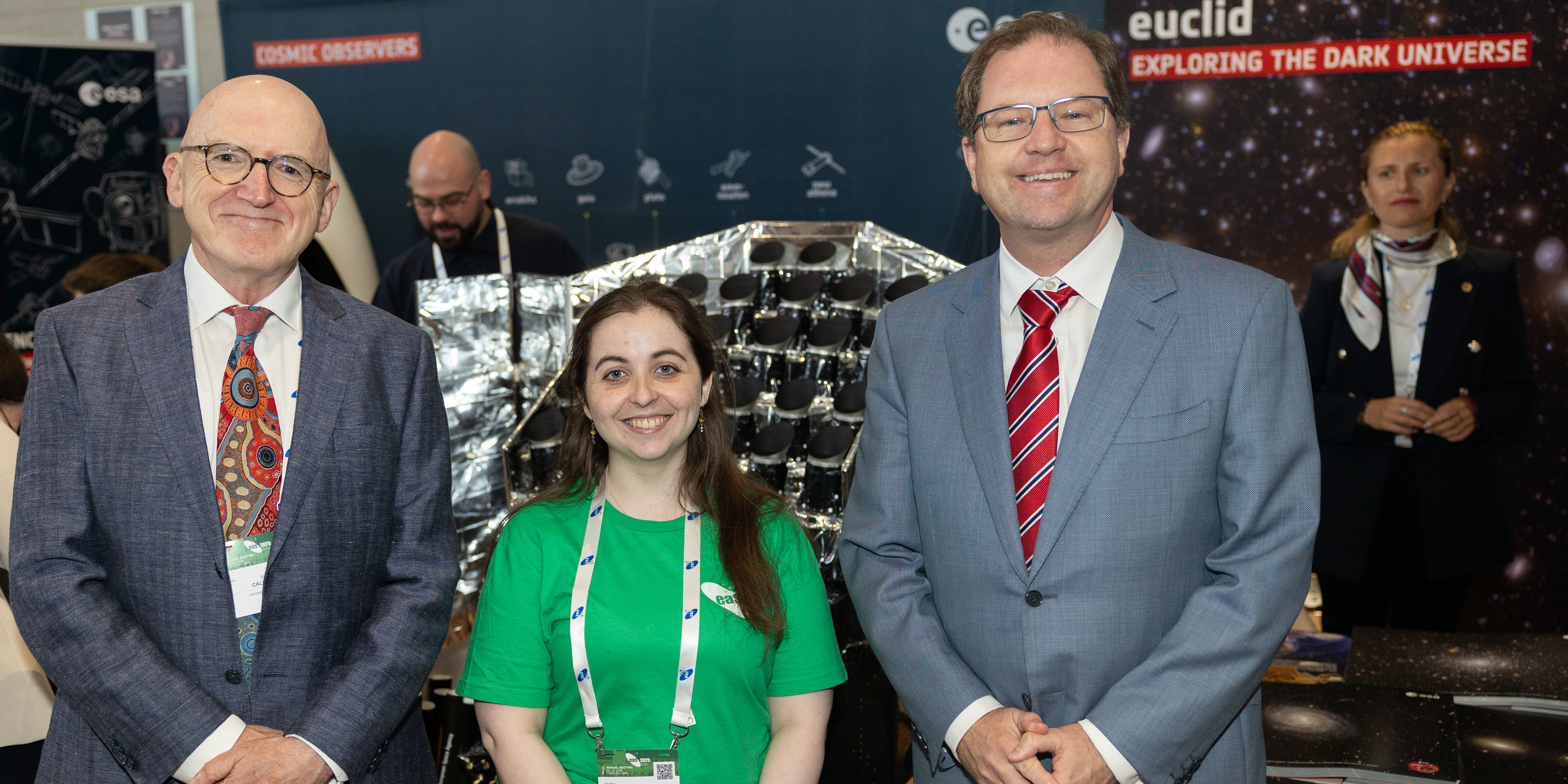 Head of the UCC School of Physics Professor Paul Callanan, UCC student Sorcha Kennelly, and Minister for Further and Higher Education, Research, Innovation and Science, James Lawless TD at the 2025 annual meeting of the European Astronomical Society. (Photo Rubén Tapia/UCC TV).
