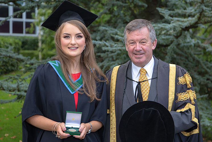 Elaine O'Brien, Gold Medal recipient and Dr Michael Murphy, President, UCC.
