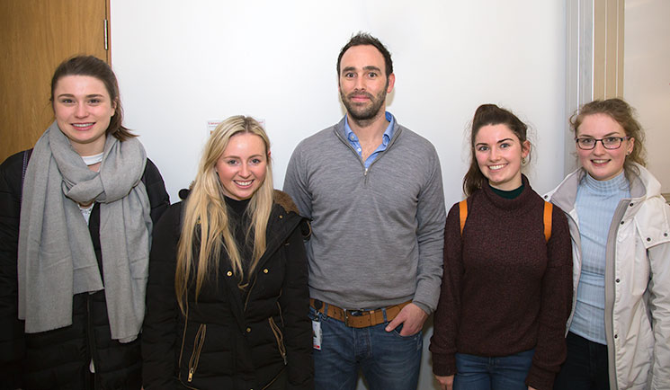 Gary Grant, Janssen (centre) and members of the UCC Biochemistry and Biotechnology Society (L to R) Ellen O’Rourke, Neasa Murphy, Aisling Flynn and Elaine O’Brien.