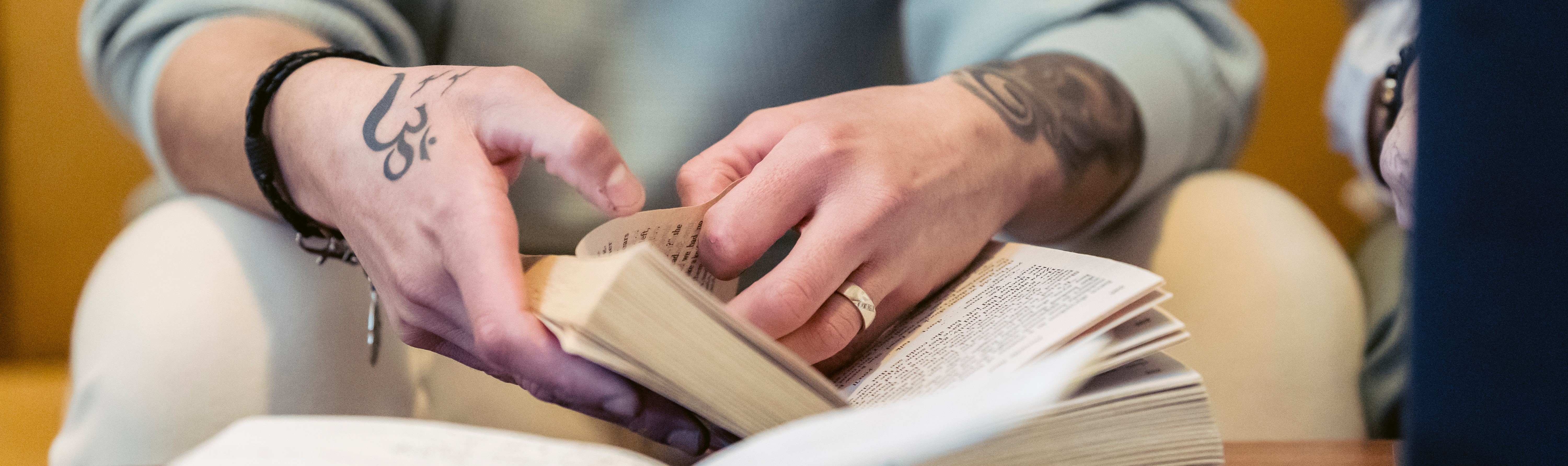 Hands holding a book