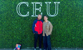 students standing in front of a CEU University sign students standing in front of a CEU University sign