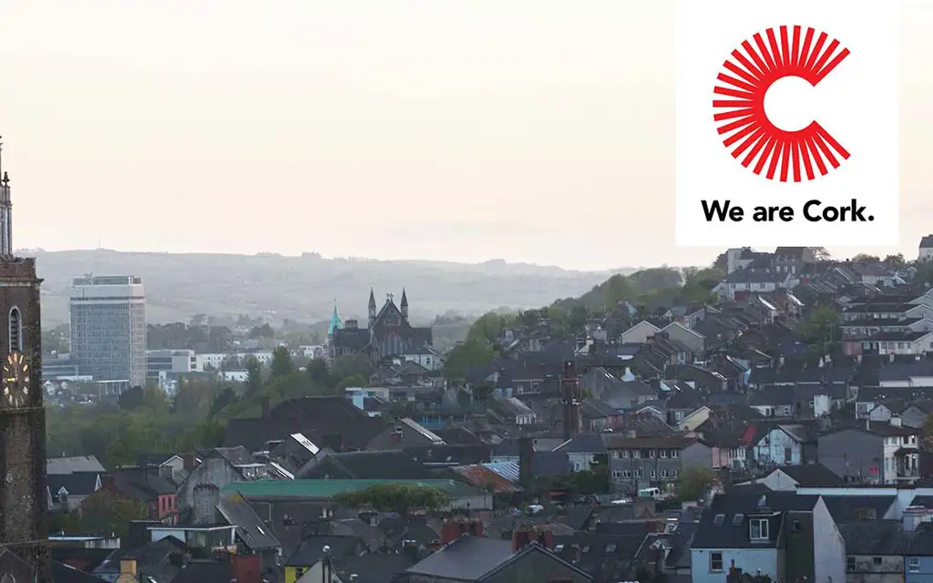 Shandon Steeple skyline with We Are Cork logo overlaid