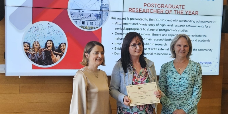 Dr Laura Linehan receiving her award from Professor Yvonne Nolan, Vice Head of Graduate Studies, and Professor Helen Whelton, Head of the College of Medicine and Health and Chief Academic Officer to the HSE South South West Hospital Group