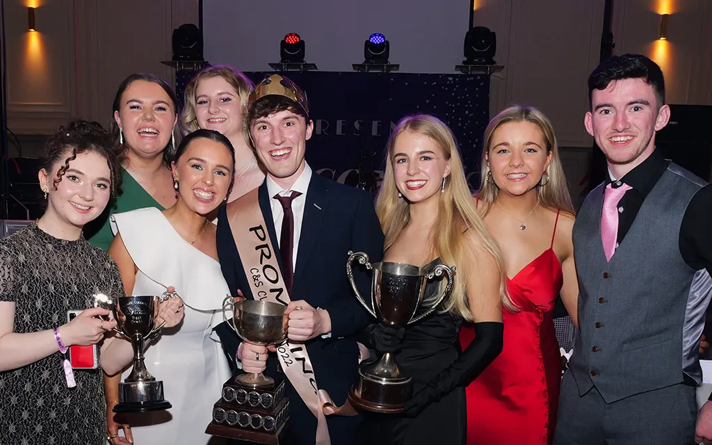 Students posing with awards at the clubs and societies ball